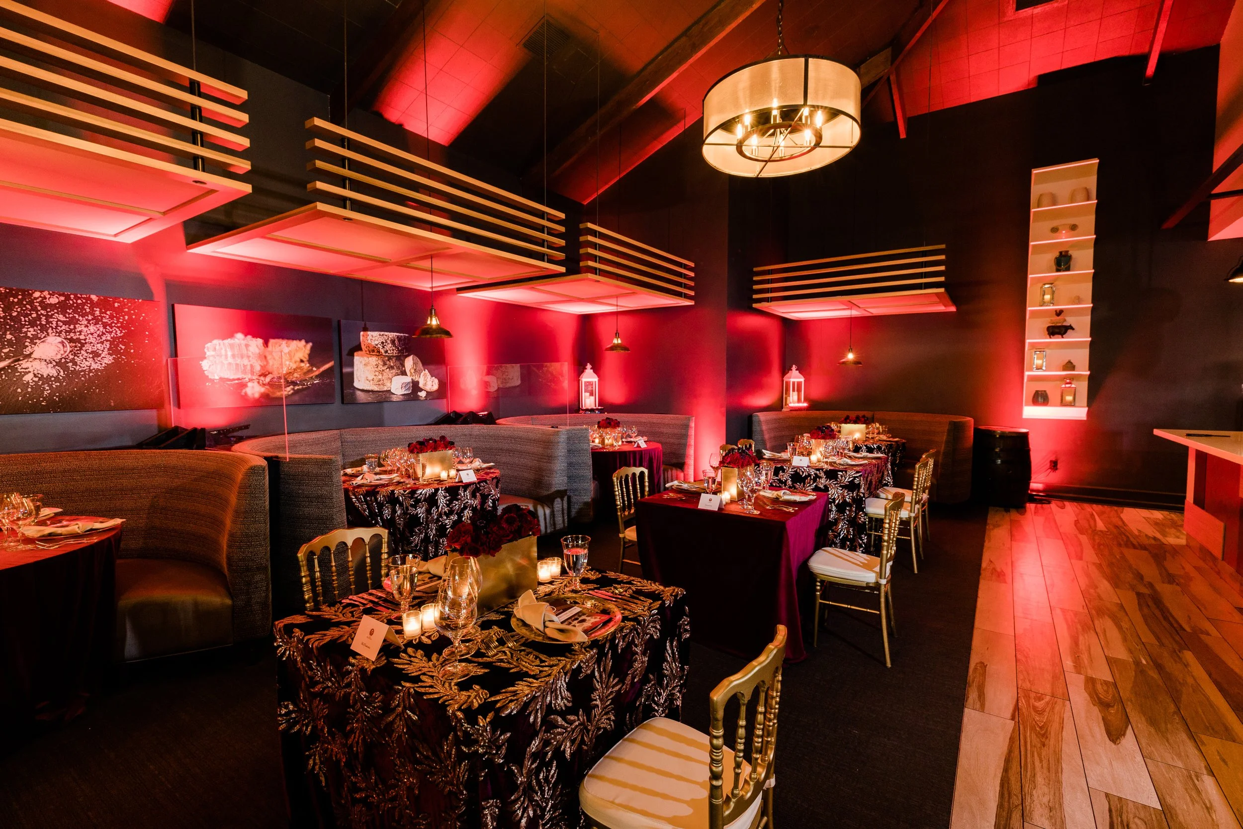 Bern's Winefest Burgundy Dinner at Haven, red lights along walls, tables set for event