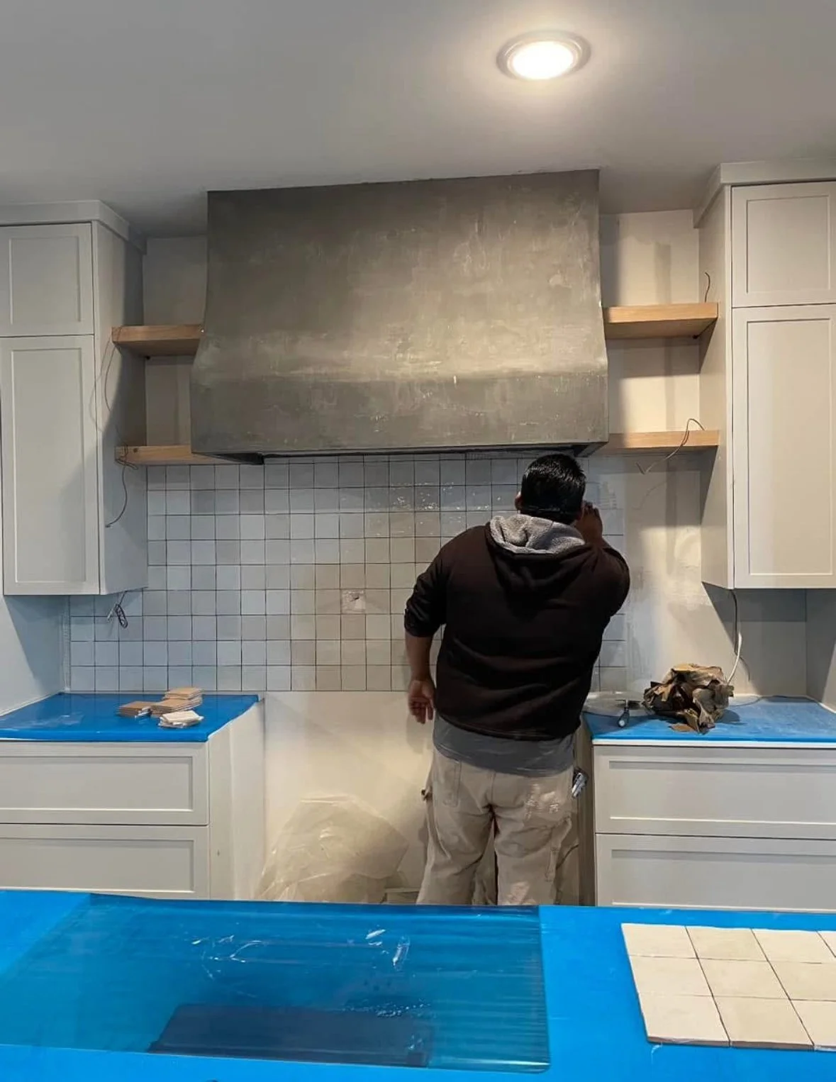 Modern Farmhouse Kitchen design, floating shelves and zellige back splash, custom made vent hood range hood under-mount farmhouse sink by Opal & Oak Mckinney Texas
