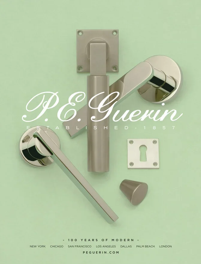 Display of modern metallic door hardware including a door handle, lock cylinder, thumb turn, and keyhole plate on a light green background with branding of P. C. Guerin.