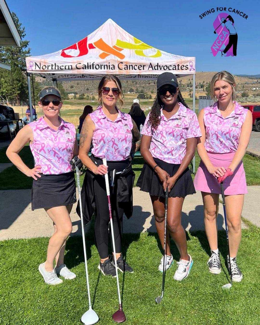 Four women standing outdoors on a golf course, wearing pink shirts with cancer ribbon patterns, holding golf clubs, smiling. Behind them is a tent labeled 'Northern California Cancer Advocates' with a golf course and hills in the background. The image features a breast cancer awareness theme and is part of a cancer fundraiser event.