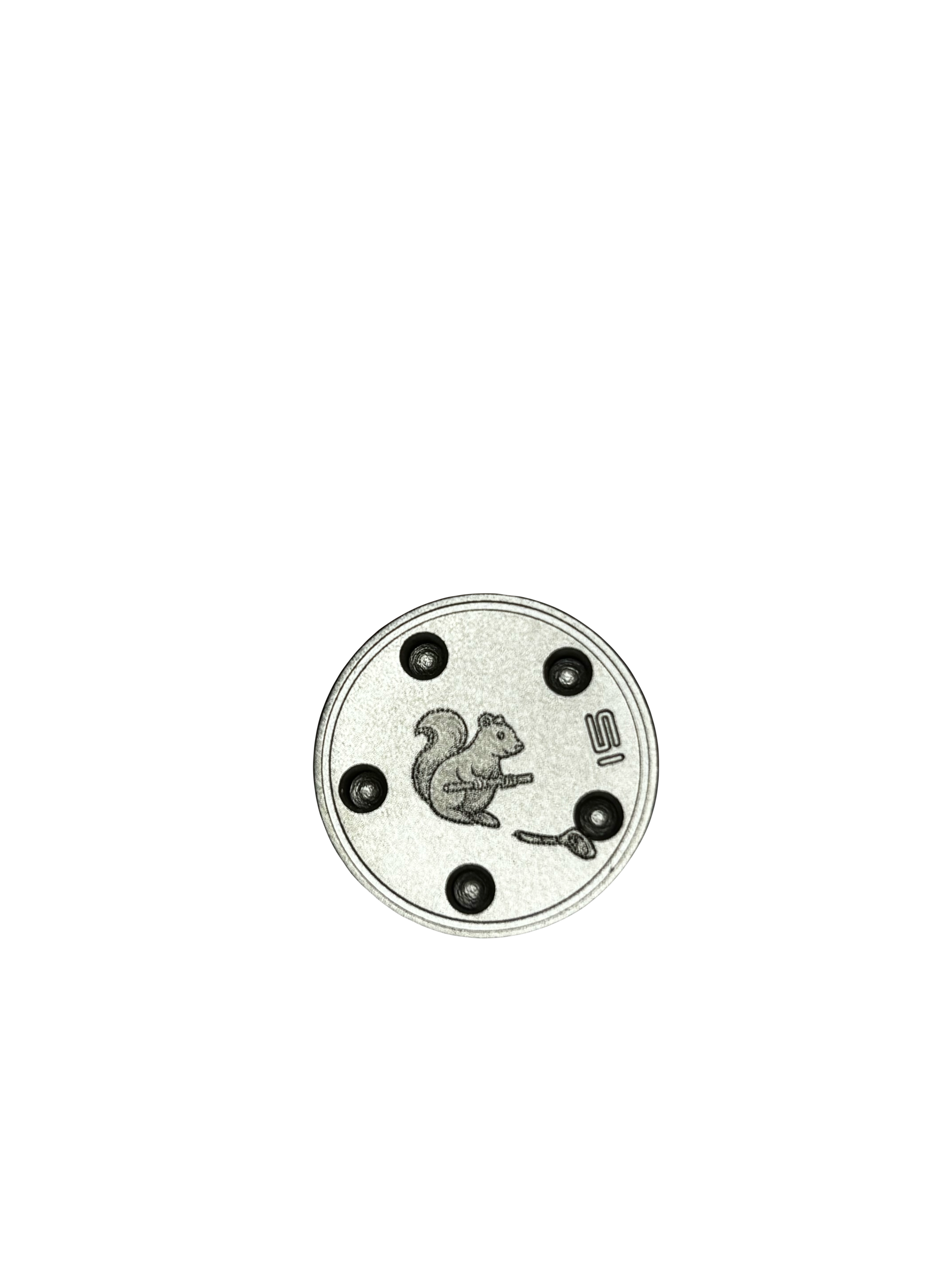 Close-up view of a vintage round clock with a squirrel illustration on its face, set against a black background.