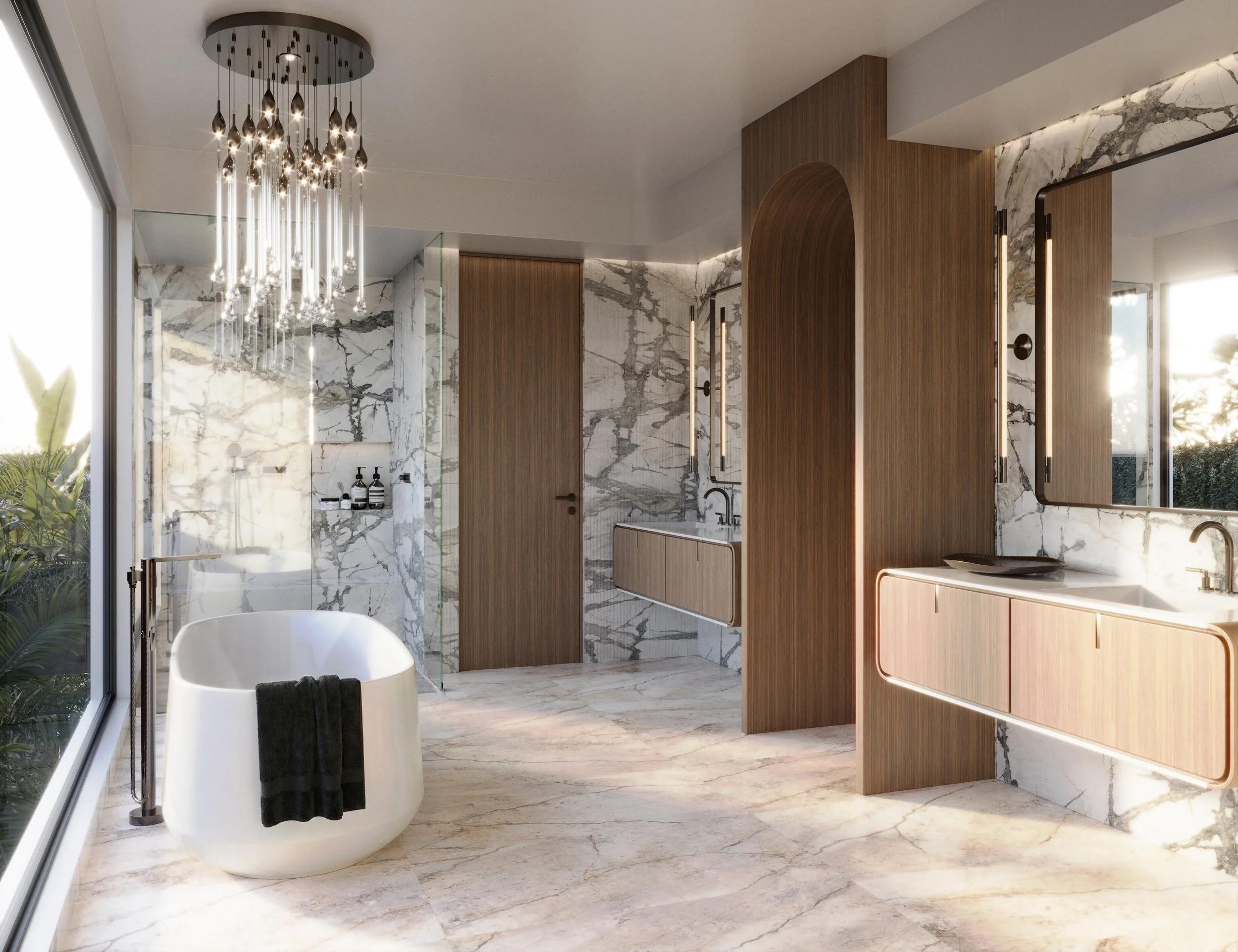 Modern bathroom with marble walls and flooring, wooden accents, a freestanding bathtub, and a chandelier with hanging light bulbs.