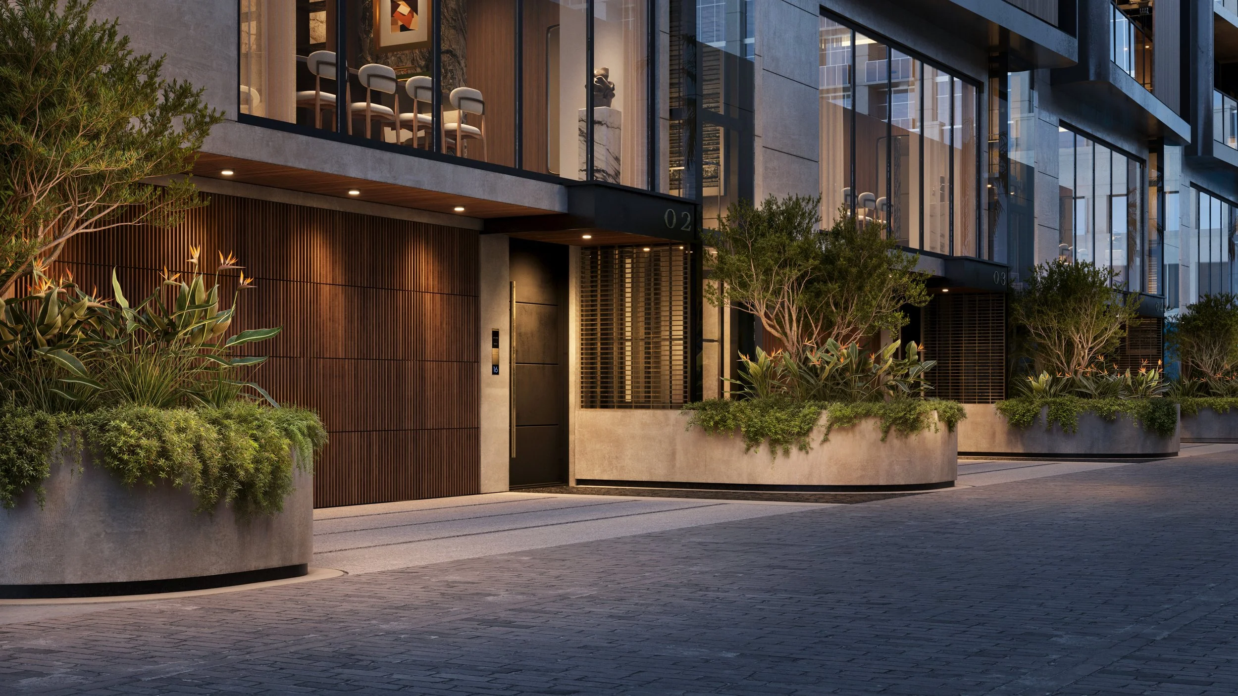 Modern multi-story building with large glass windows, wooden wall accents, and landscaped planters with green plants and small trees along the sidewalk
