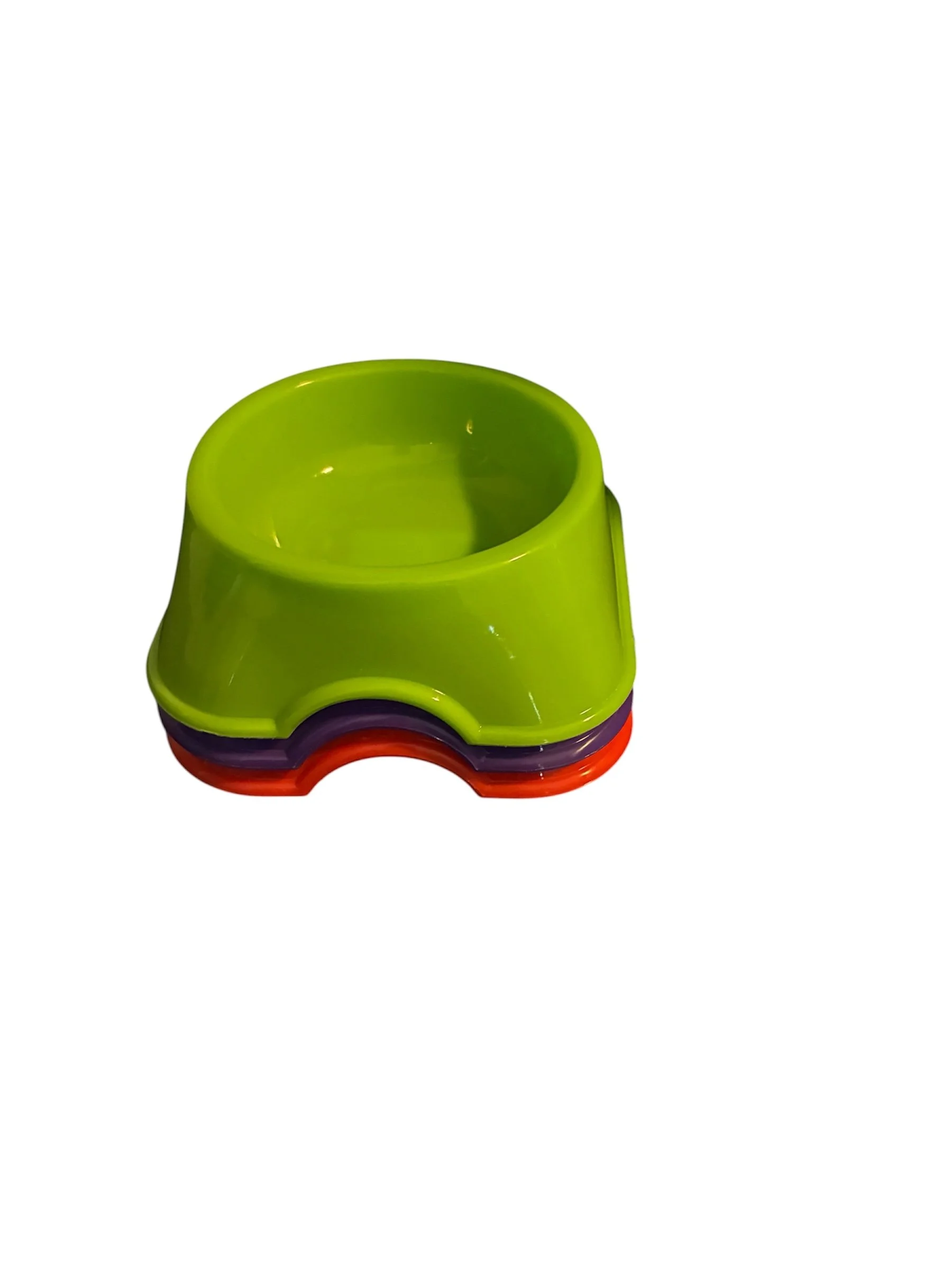 Stacked Classic Colortone Midi Dish bowls in green, red and purple.