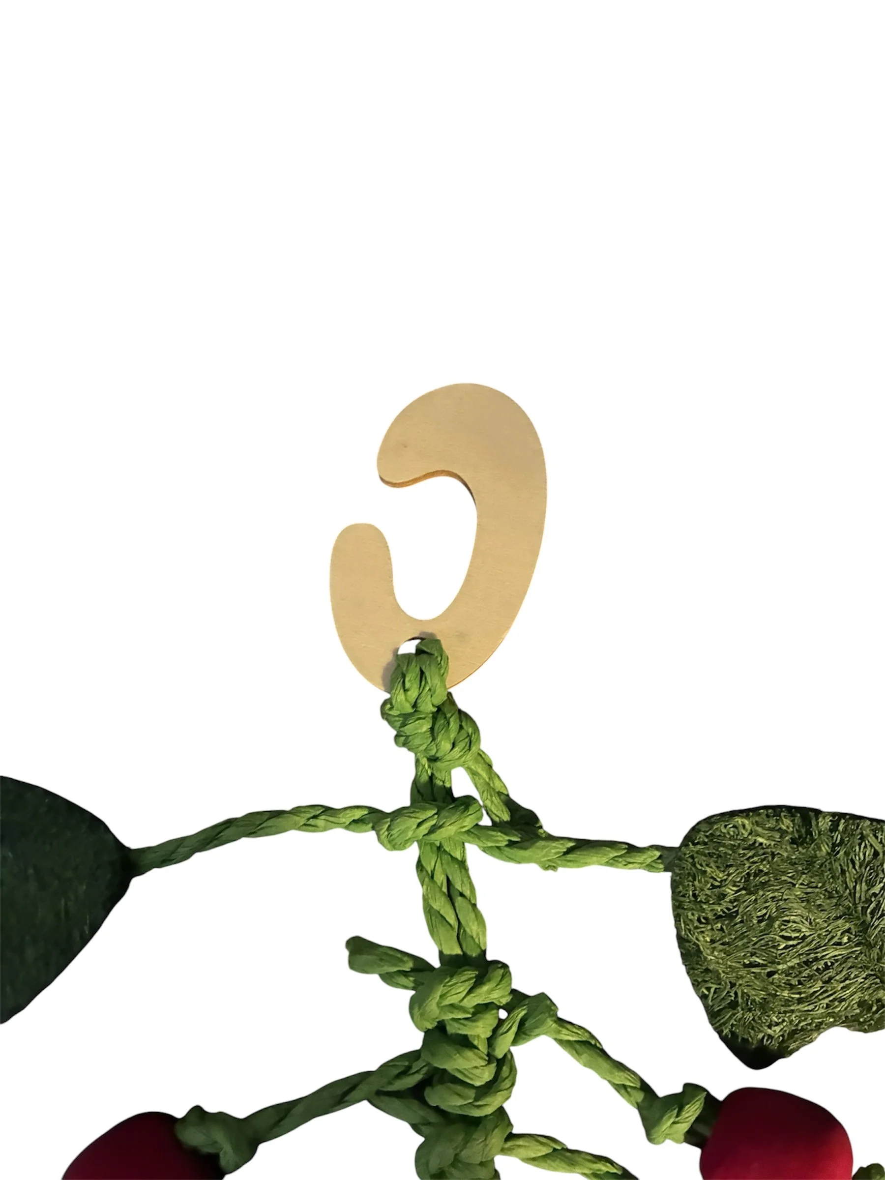 Close-up of the wooden hanging hook on the Little Friends Berry Nibble Hanger.