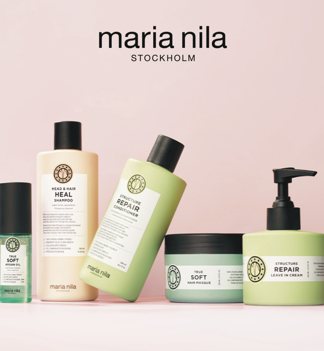 Bottles of Maria Nila products on a pink background, with a logo in black text above