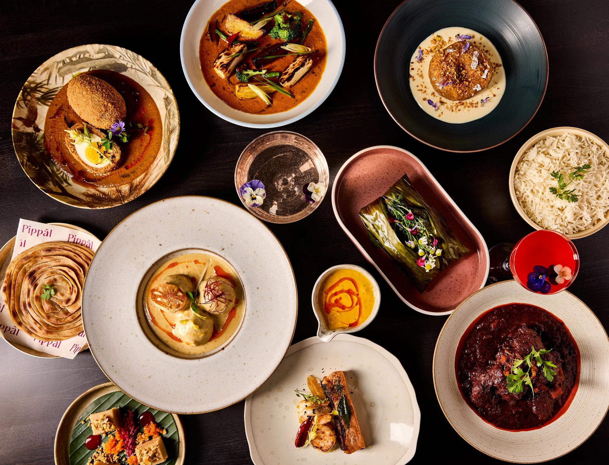 dining table with Indian food at Pipal, photographed by Neetu Laddha, restaurant photographer San Francisco