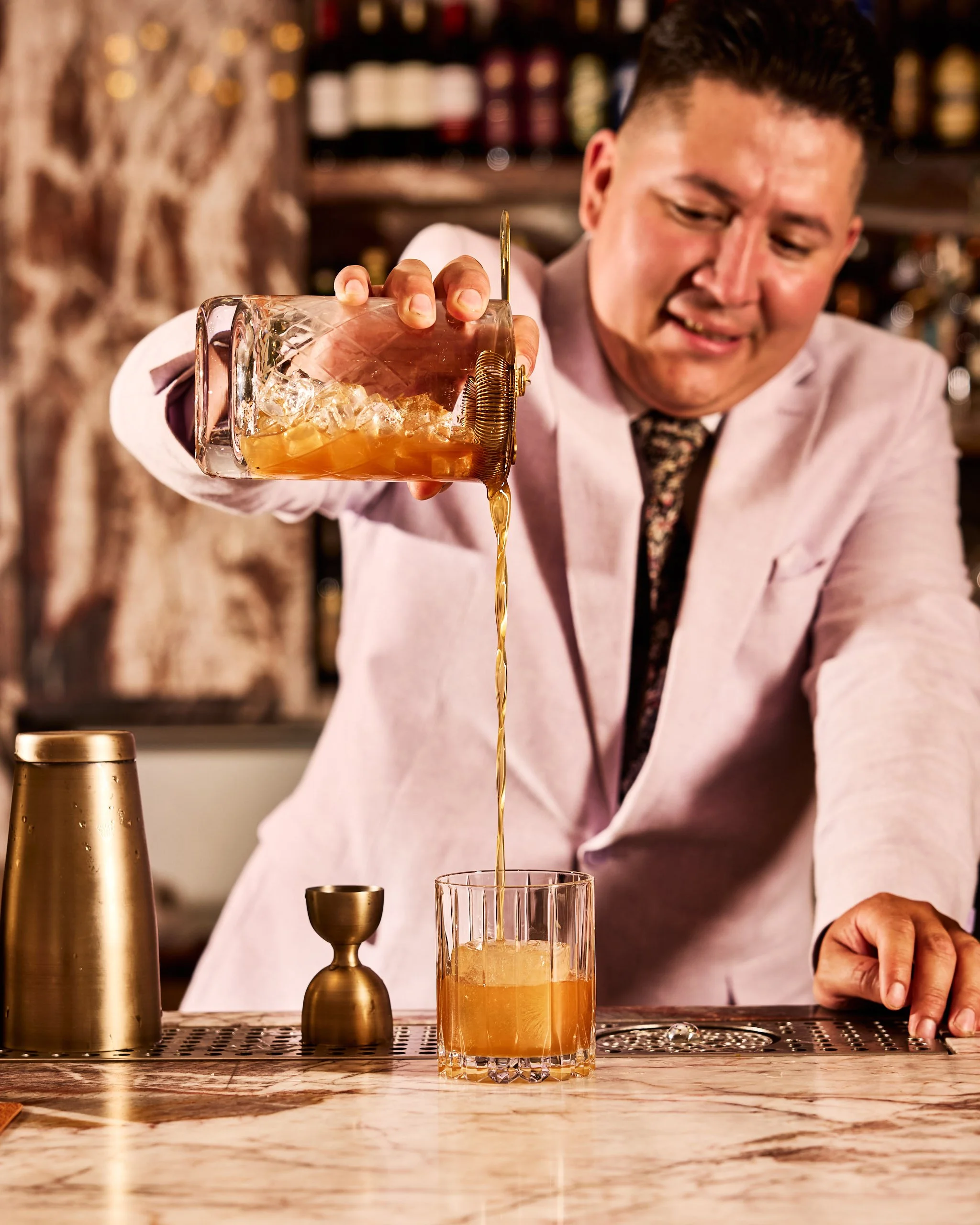 Bartender preparing cocktail at Pipal Regional Indian, photographed by Neetu Laddha, restaurant photographer San Francisco & Sacramento