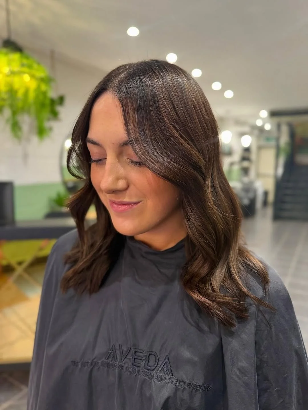 Professional hair extension application in salon