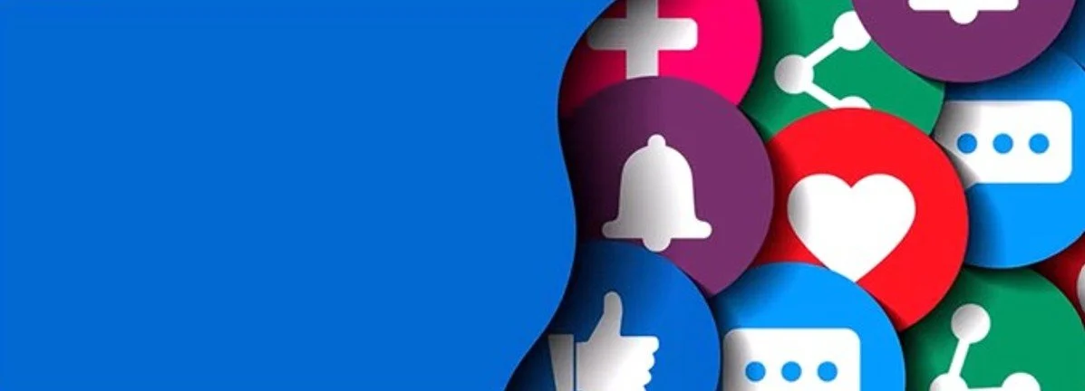 Collection of colorful social media icons like heart, thumbs up, heart, notification bell, and message bubbles on a blue background.