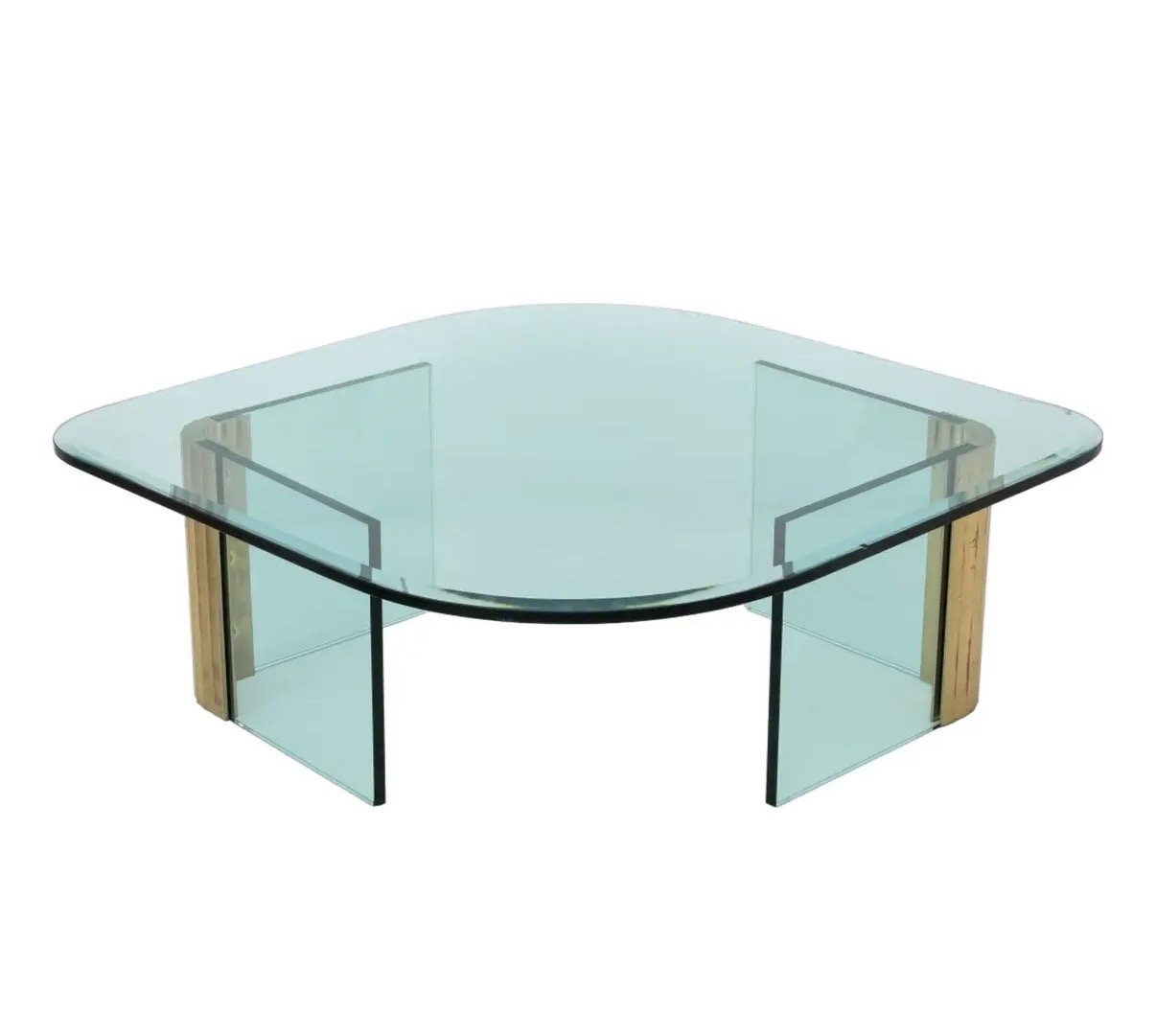 Pace Collection Glass Coffee Table
Circa 1970s. 

Grounded yet visually light, this vintage Pace Collection coffee table is defined by its low, sculptural profile and softly curved glass form. The generous surface invites use, while the transparency 
