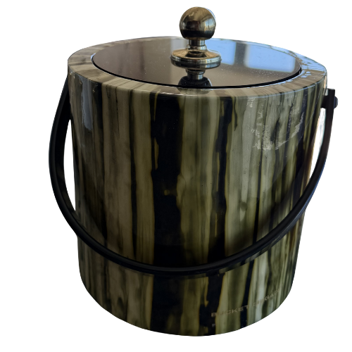 A sculptural entertaining piece with unmistakable vintage character, this marbleized ice bucket blends smoky olive, black, and ivory tones in a dramatic vertical pattern that feels both modern and distinctly collectible. Finished with a glossy black 