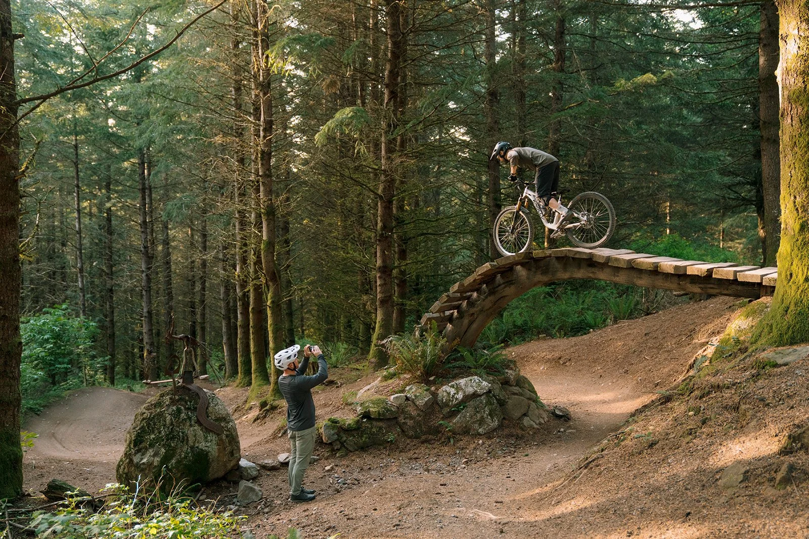 rider on narrow wooden cycle path