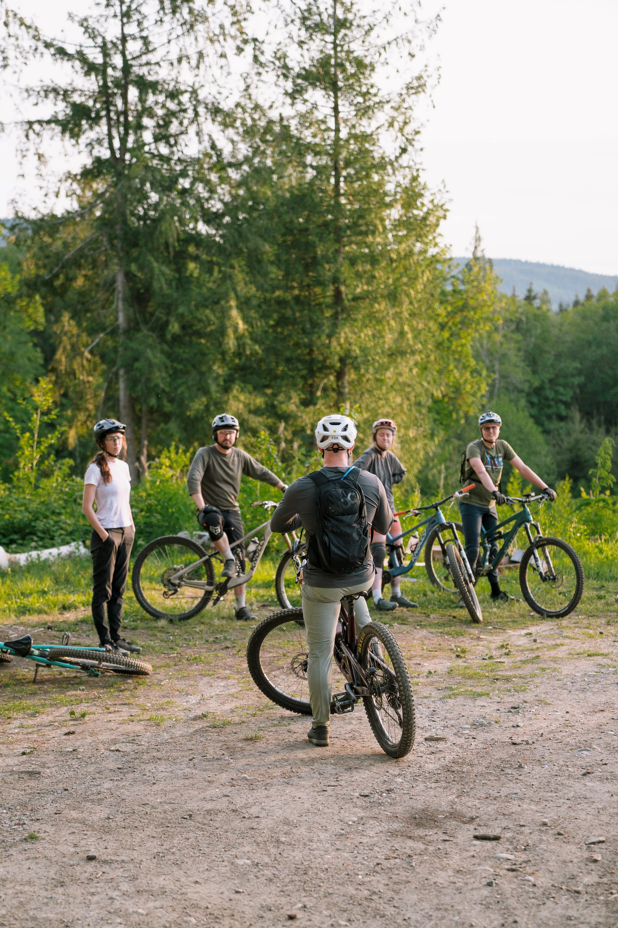 Group of riders listening to coach