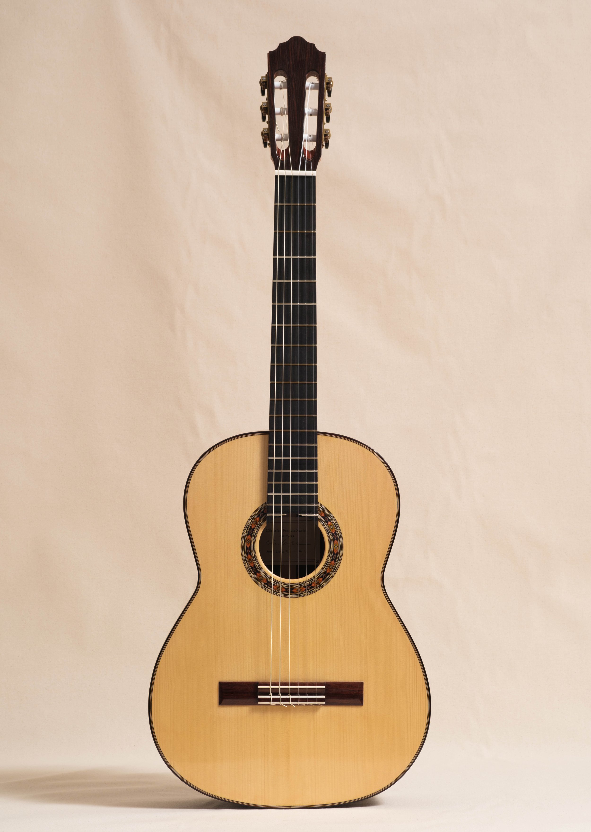 European spruce - top
 East Indian rosewood - back and sides
 Sloane tuners