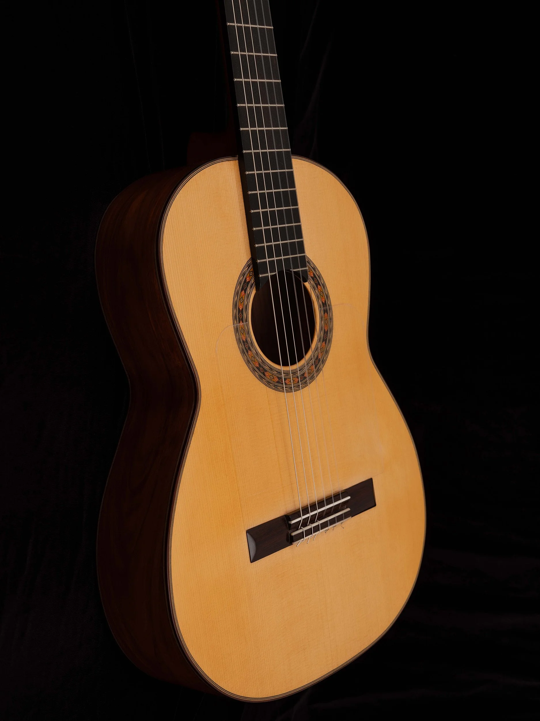 Flamenco Negra
 Spruce - top
 Pau Ferro - back and sides
 Sloane tuners