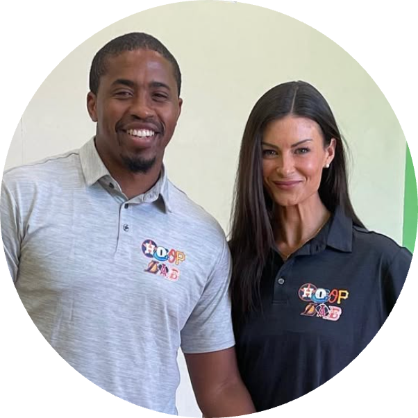 Two individuals smiling, standing next to each other, wearing polo shirts with a 'HOOP LAB' logo.