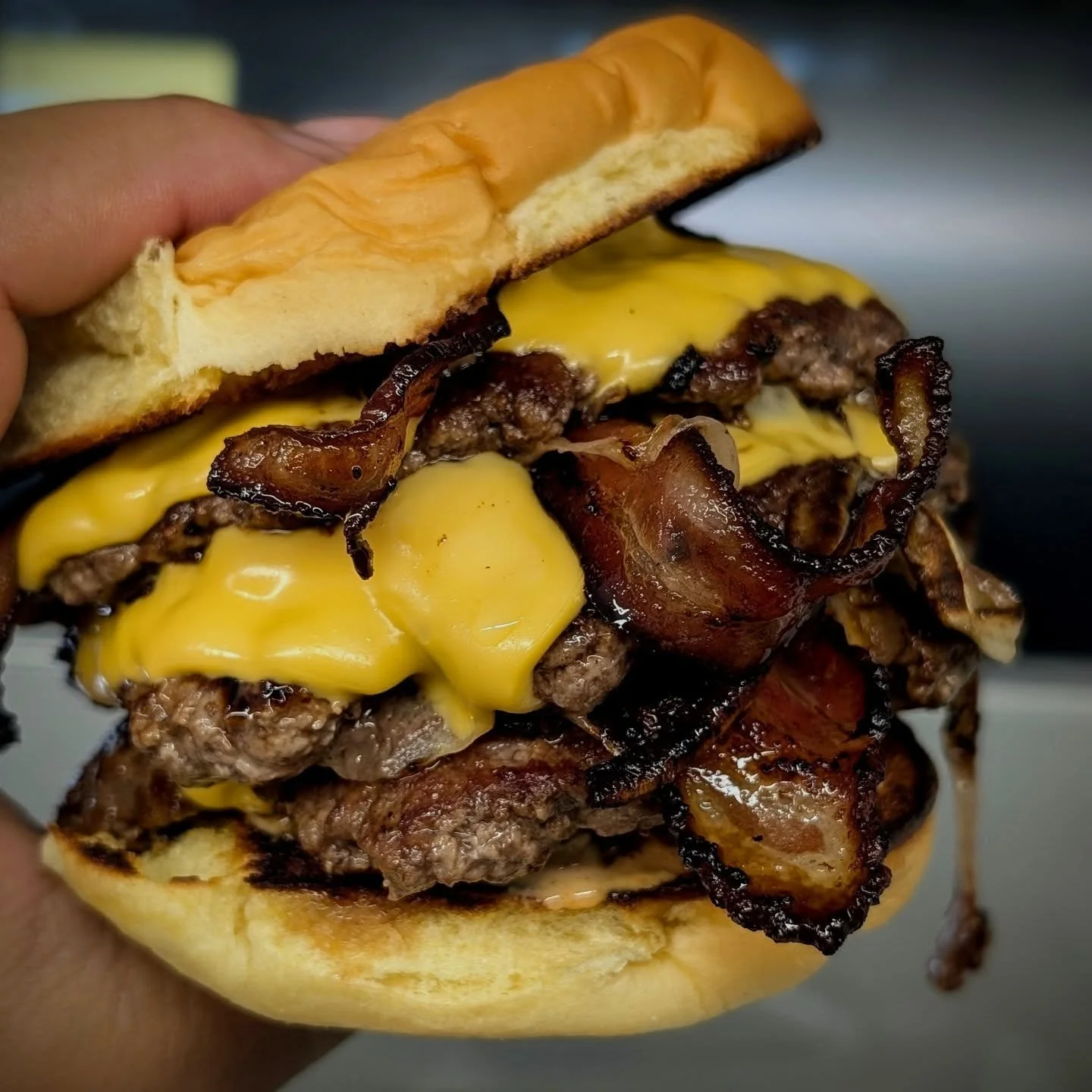 Oh yeah, you can add as many patties as you can handle. Here we have a triple decker Bacon QP Burger ordered by our friends at the @monheganboat 

Proceed with caution!

#qpburgermaine #smashburger #tripledecker