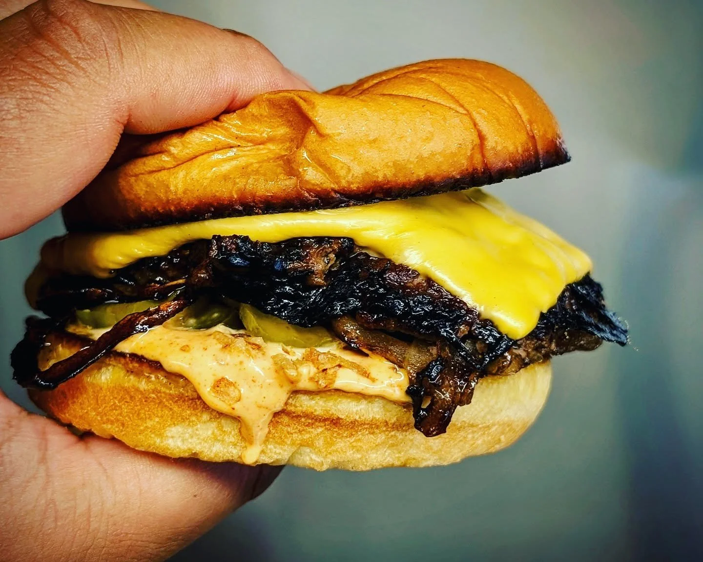 Introducing THE QP Burger....

Paper-thin onions smashed into the beef, pickled jalapeno, dill pickle, crispy fried onion, American cheese, QP sauce.

#rollcall #qpburgermaine #smashburger #quarterpound #goodtomeetyou