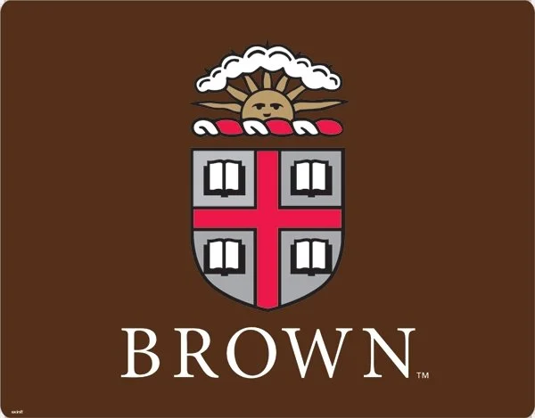 A logo featuring a shield with a red cross and four open books, a sun with a face, cloud, and hands, along with the word "BROWN" underneath.