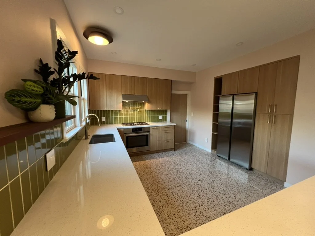 Warm Modern Kitchen balances architectural restraint with a uniquely punk organic sensibility, introducing moments of color and pattern within a grounded material palette. Natural wood cabinetry provides warmth and structure, while locally produced F