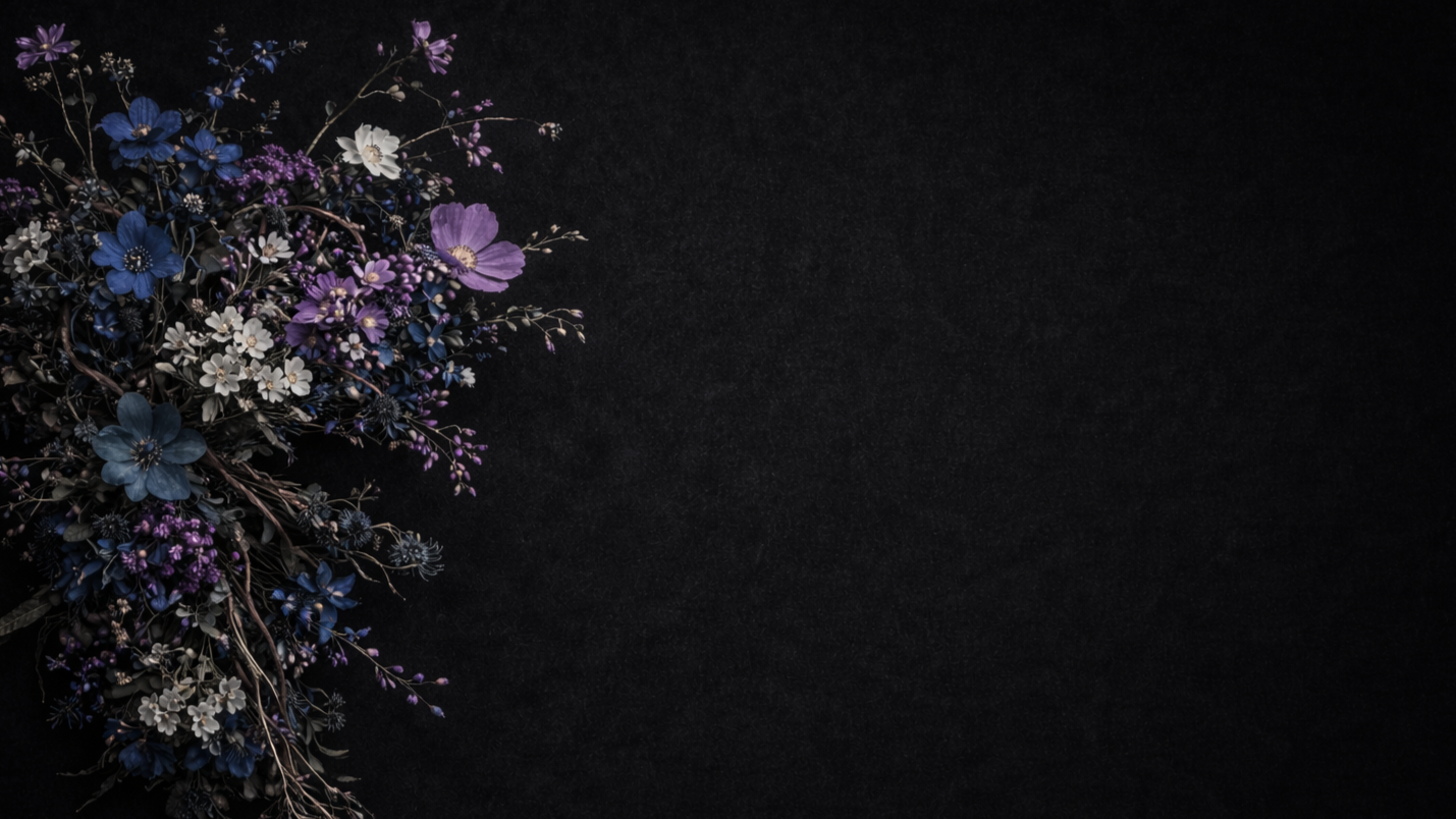 Arrangement of purple, white, and blue flowers on the left side against a black background.
