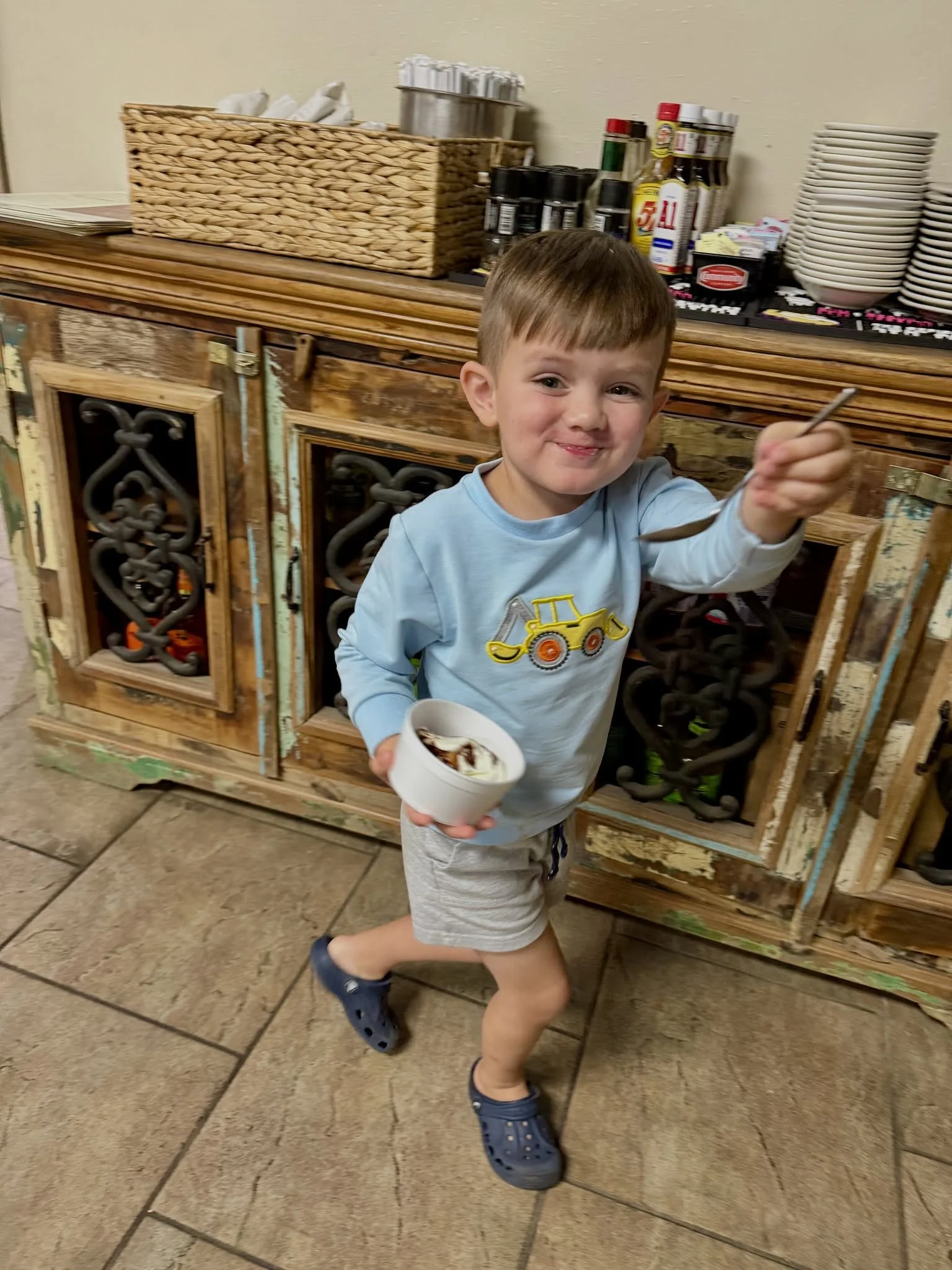 Young guest smiling inside Kelley's Village Inn