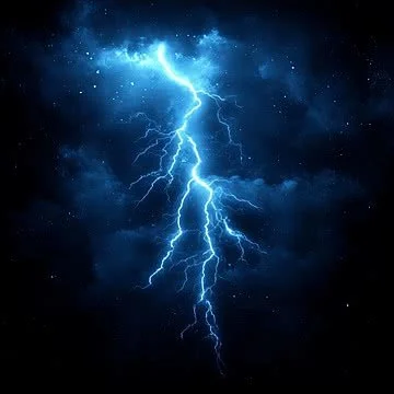 Lightning bolt striking through a dark stormy sky.