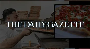 A man serving pizza in a restaurant with a sign reading 'The Daily Gazette' overlayed on the image.