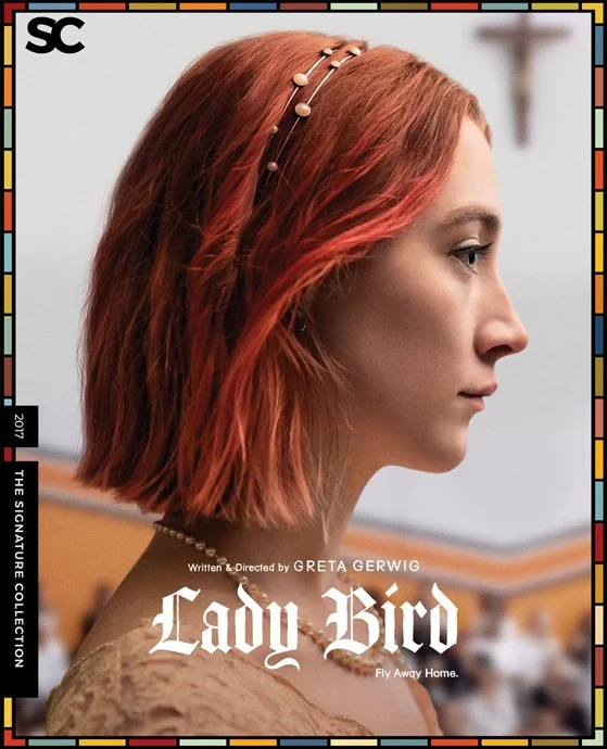 Close-up side profile of a woman with short red hair wearing a pearl headband and a pearl necklace.