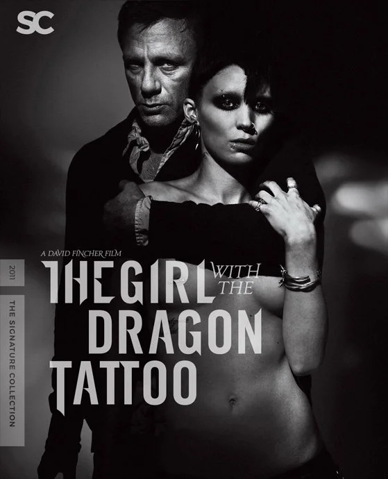 Black and white promotional poster for the movie "The Girl with the Dragon Tattoo" featuring a man and a woman.