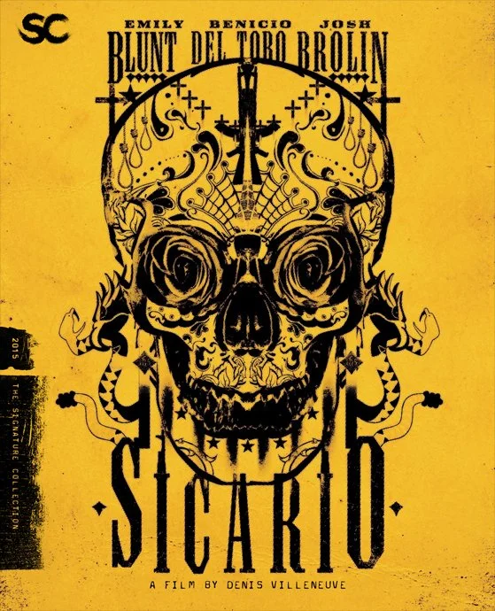 Movie poster for 'Sicario', featuring a stylized black skull with intricate designs on a yellow background. Includes names Emily Blunt, Benicio Del Toro, Josh Brolin, and mentions a film by Denis Villeneuve.