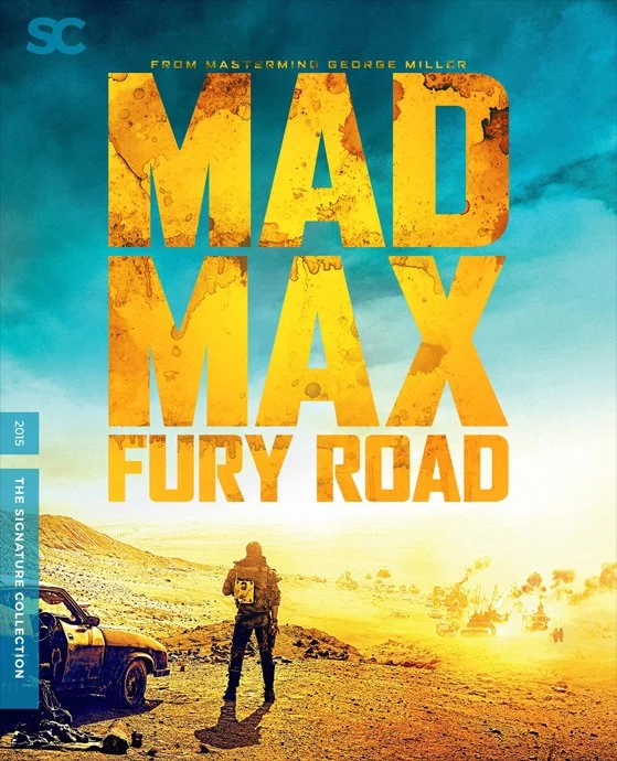 Movie poster for Mad Max: Fury Road showing a desert landscape with a lone figure standing next to a vehicle, with explosions and dust in the background. The title 'MAD MAX FURY ROAD' is prominently displayed in large yellow and orange letters.