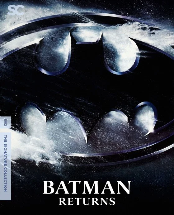 Cover of Batman Returns featuring Batman's iconic bat symbol, surrounded by a snowy background.