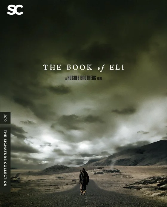 Movie poster for 'The Book of Eli' showing a lone man walking on a deserted road in a barren landscape under a dark, cloudy sky.