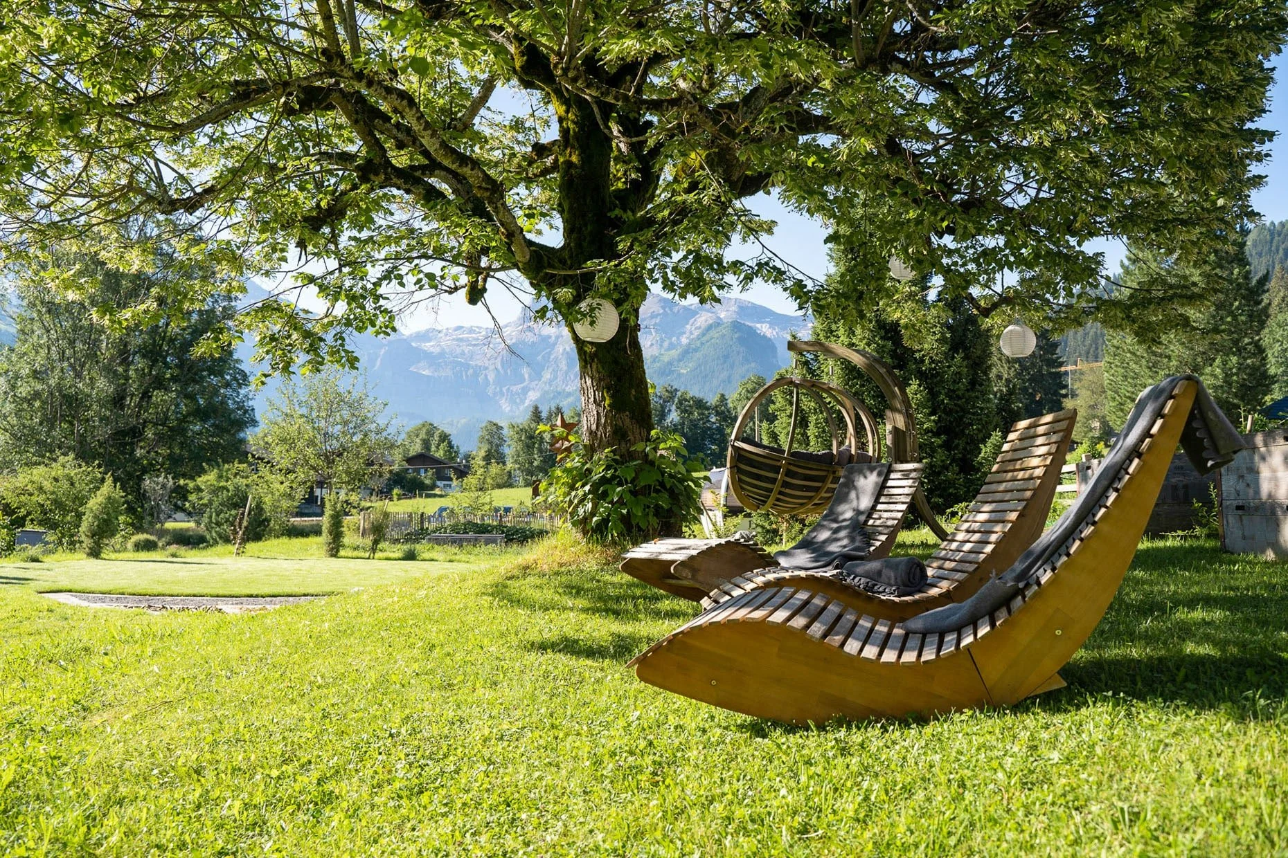Lenk Lodge hotel garden in the spring.