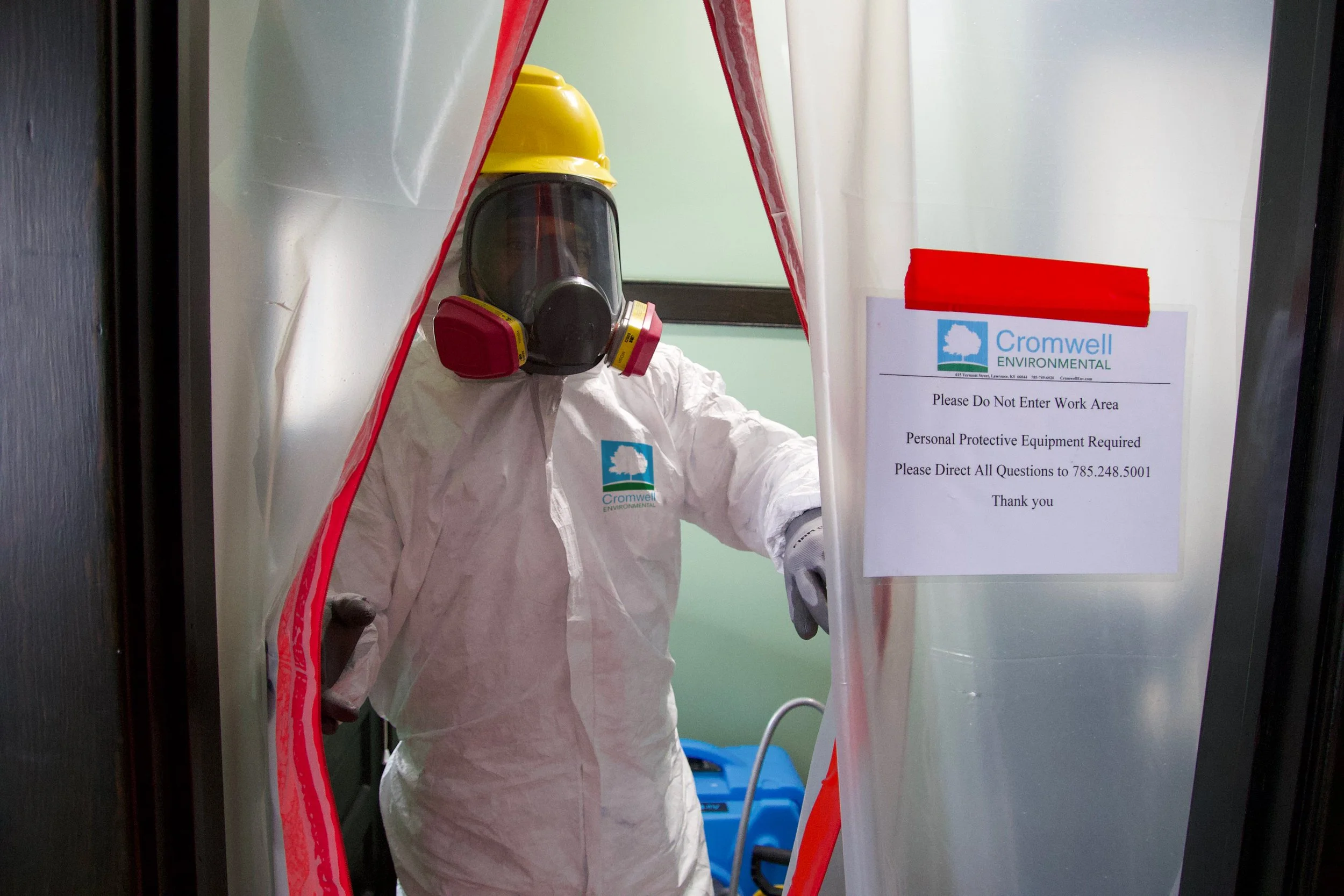 Cromwell staff performing an asbestos abatement.