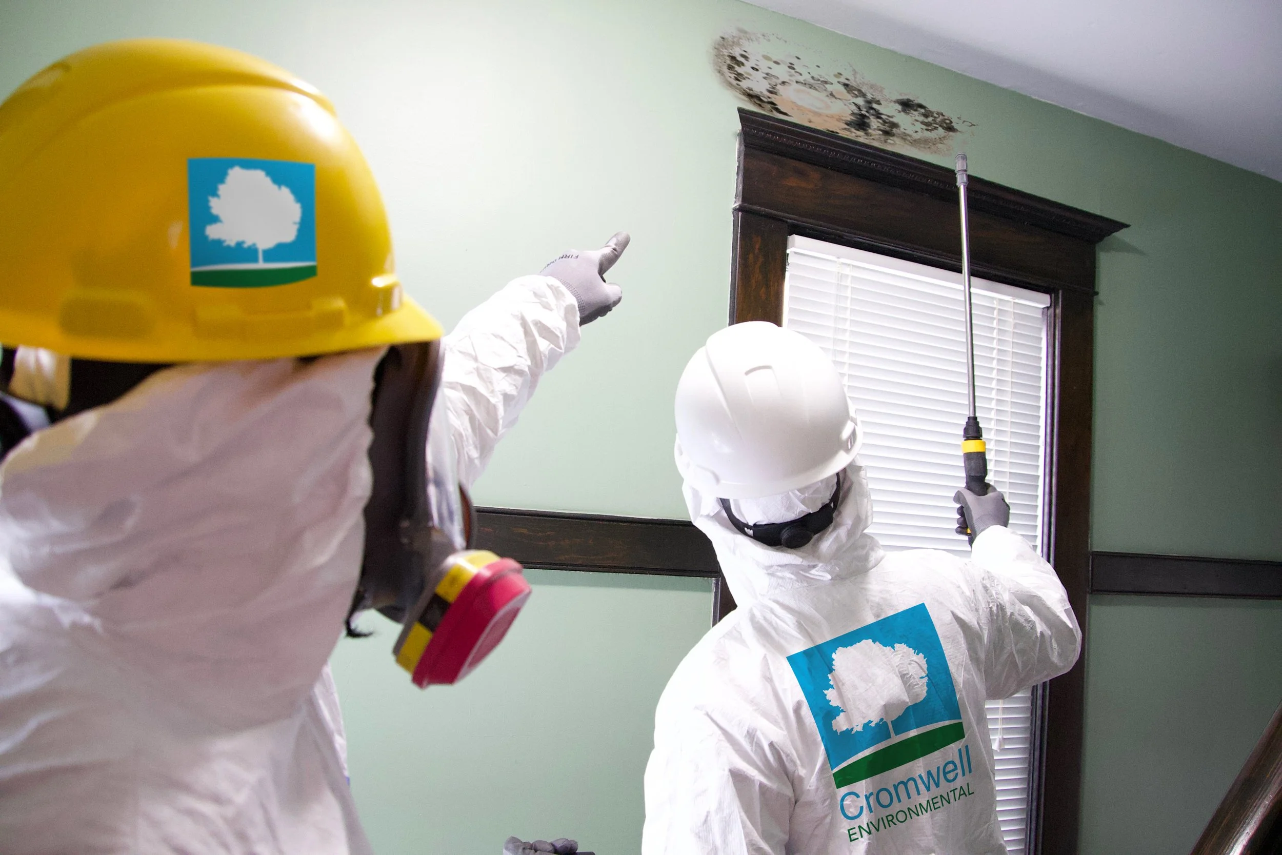 Cromwell staff testing for mold inside a house.