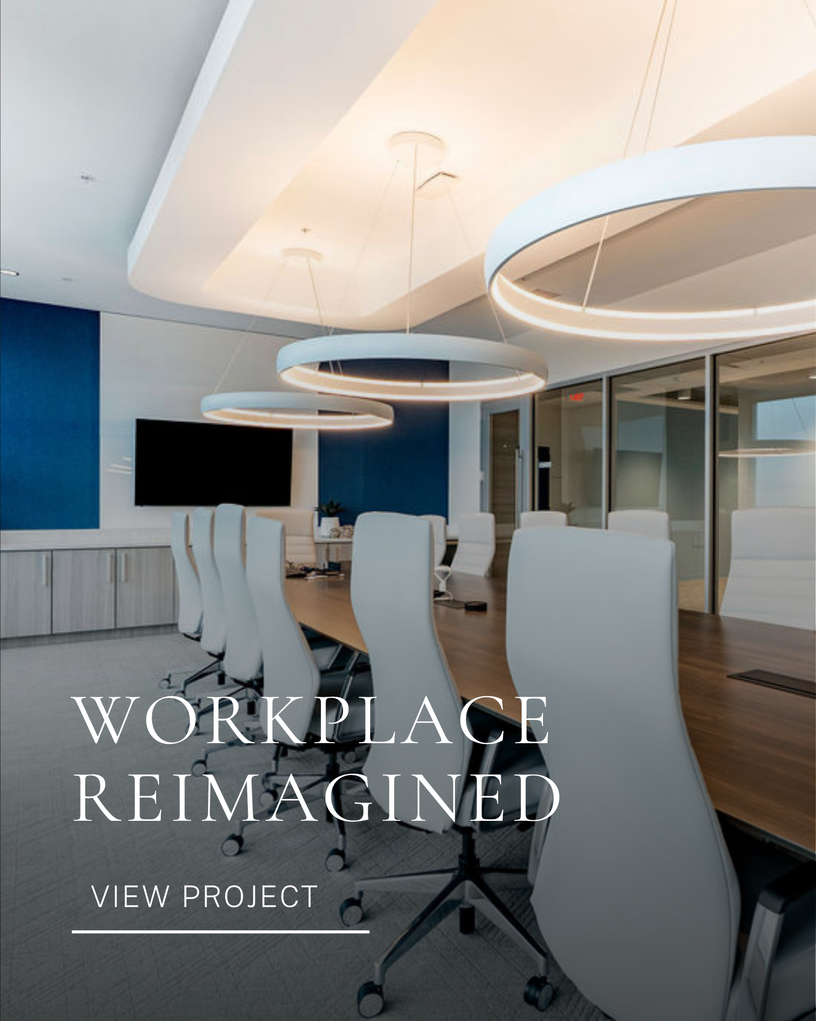 Commercial workplace interior design featuring modern furnishings, statement lighting and glass office walls.