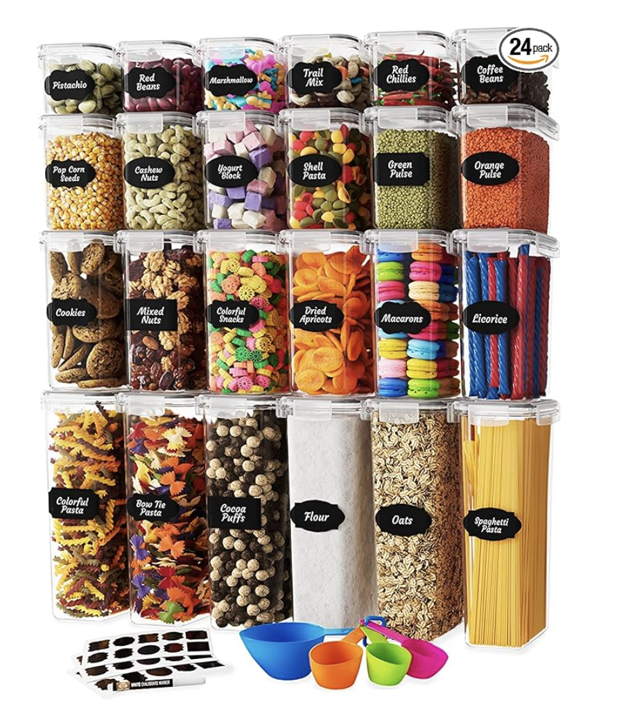 Clear pantry storage bins with labels for organized kitchen and pantry storage.