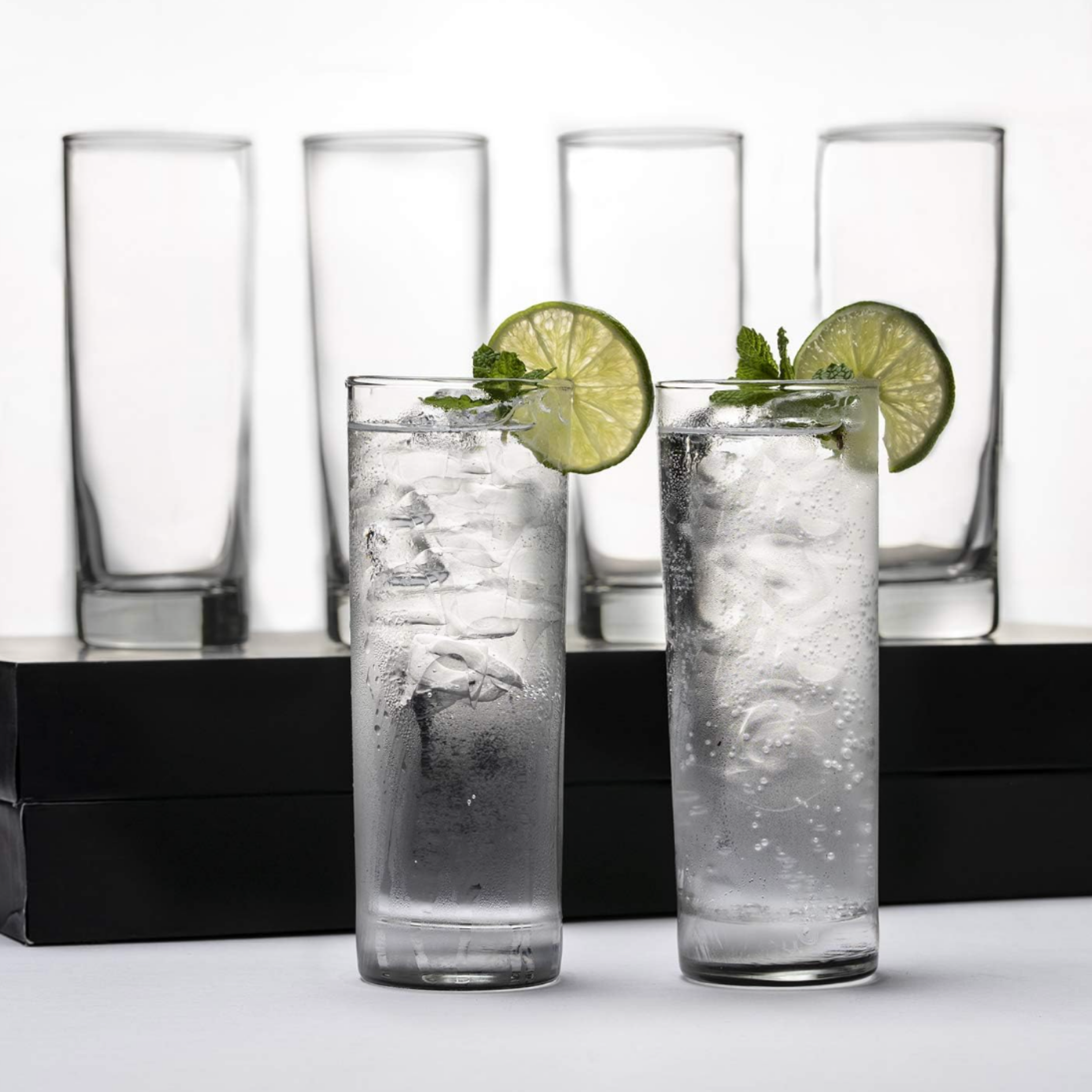 1. Sparkling water with lime and mint styled for modern home entertaining.