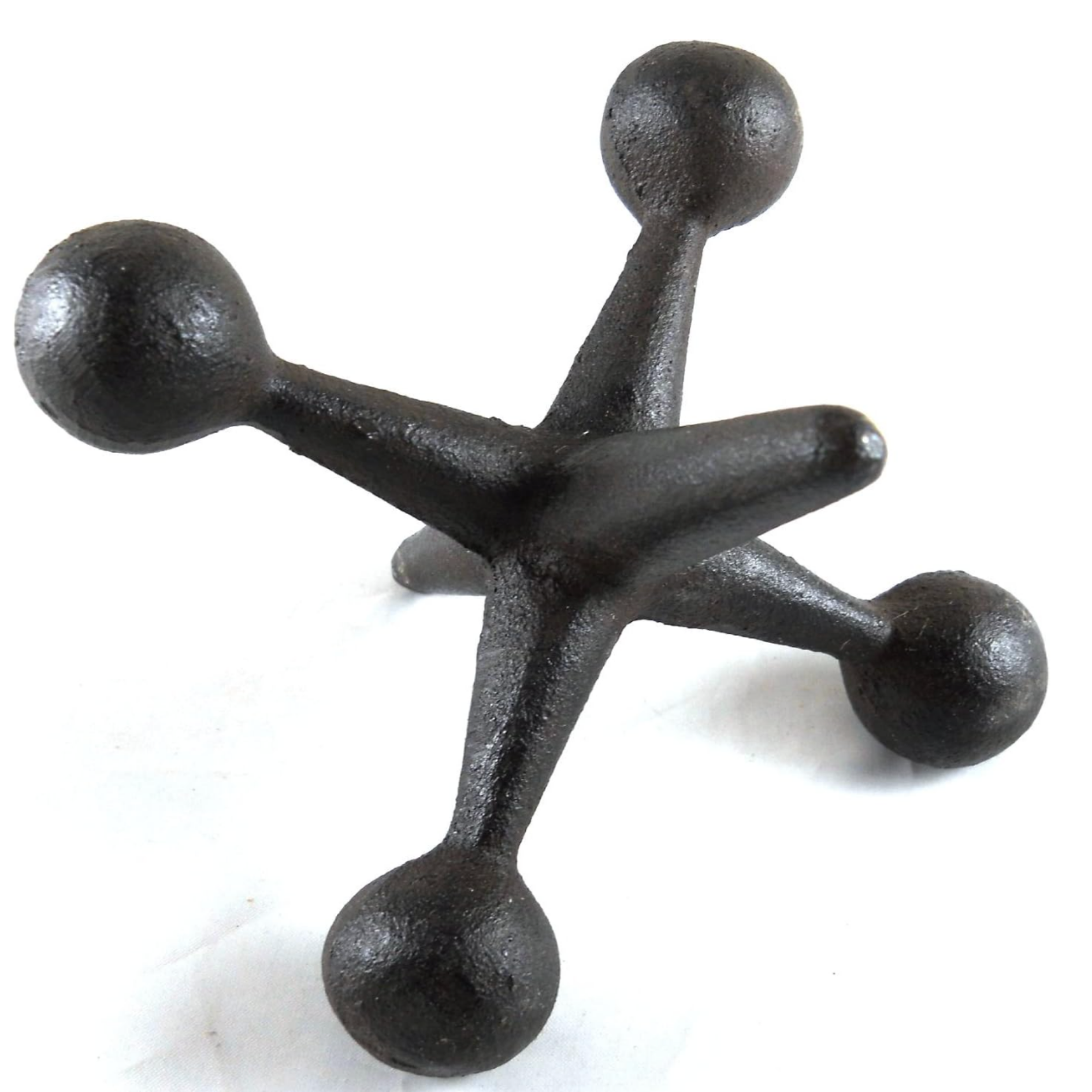 Vintage black cast iron decorative nails with rustic detailing.