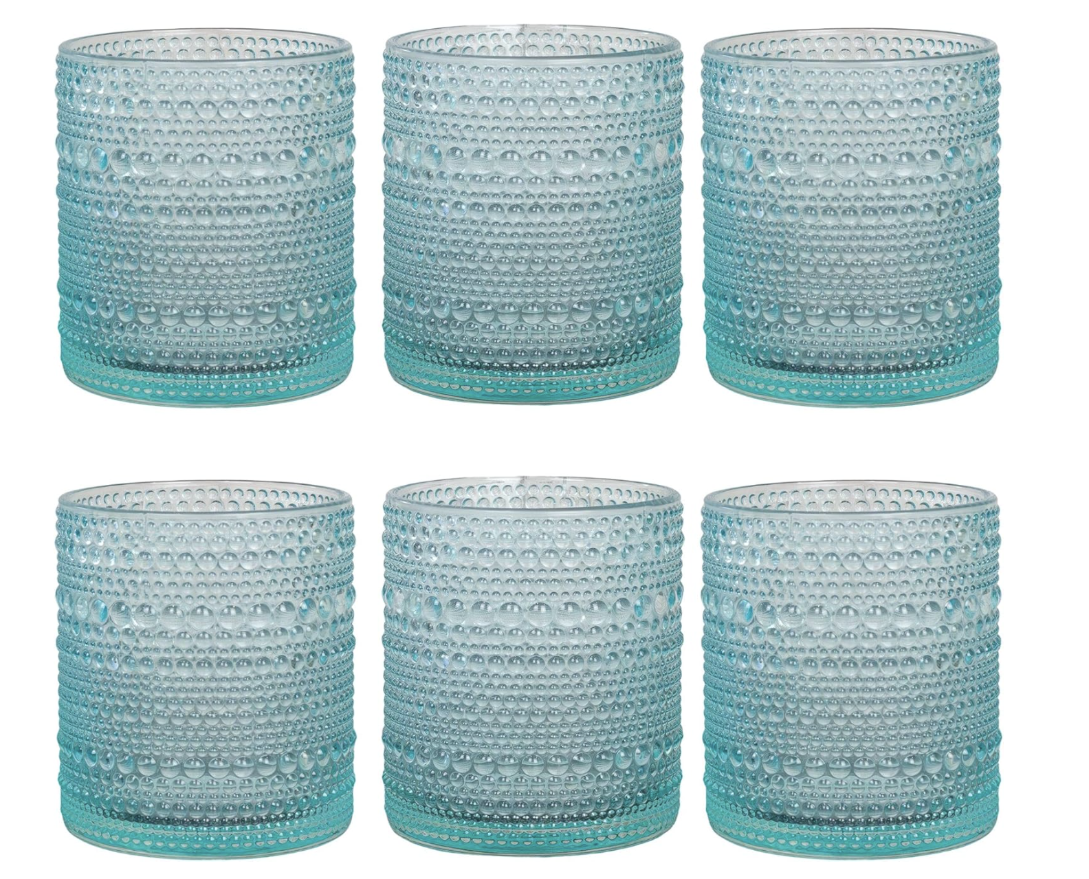 Blue textured glass candle holders with raised dot detailing for curated home decor.