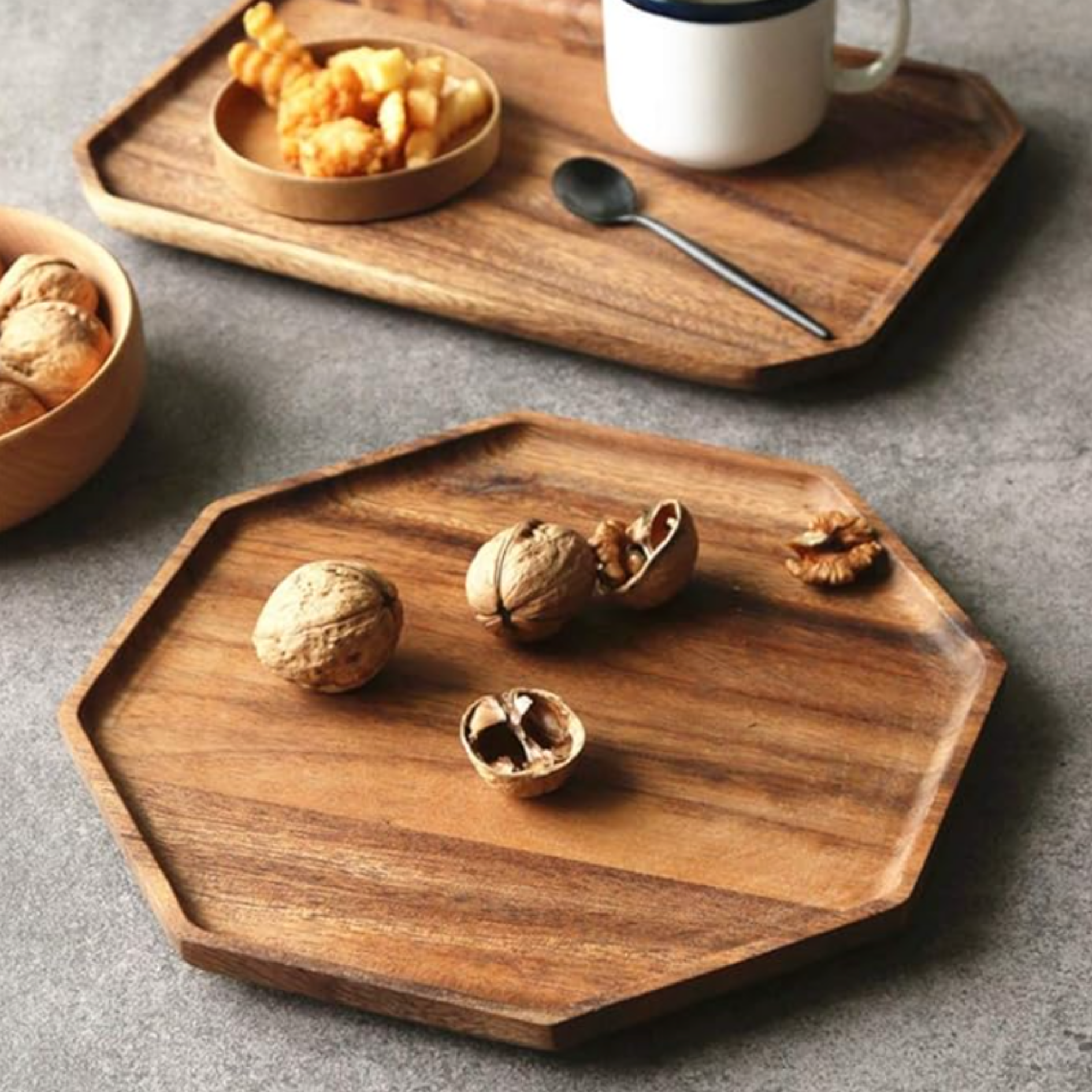 Wood serving tray styled with a white mug, snack bowls and simple home entertaining accessories.