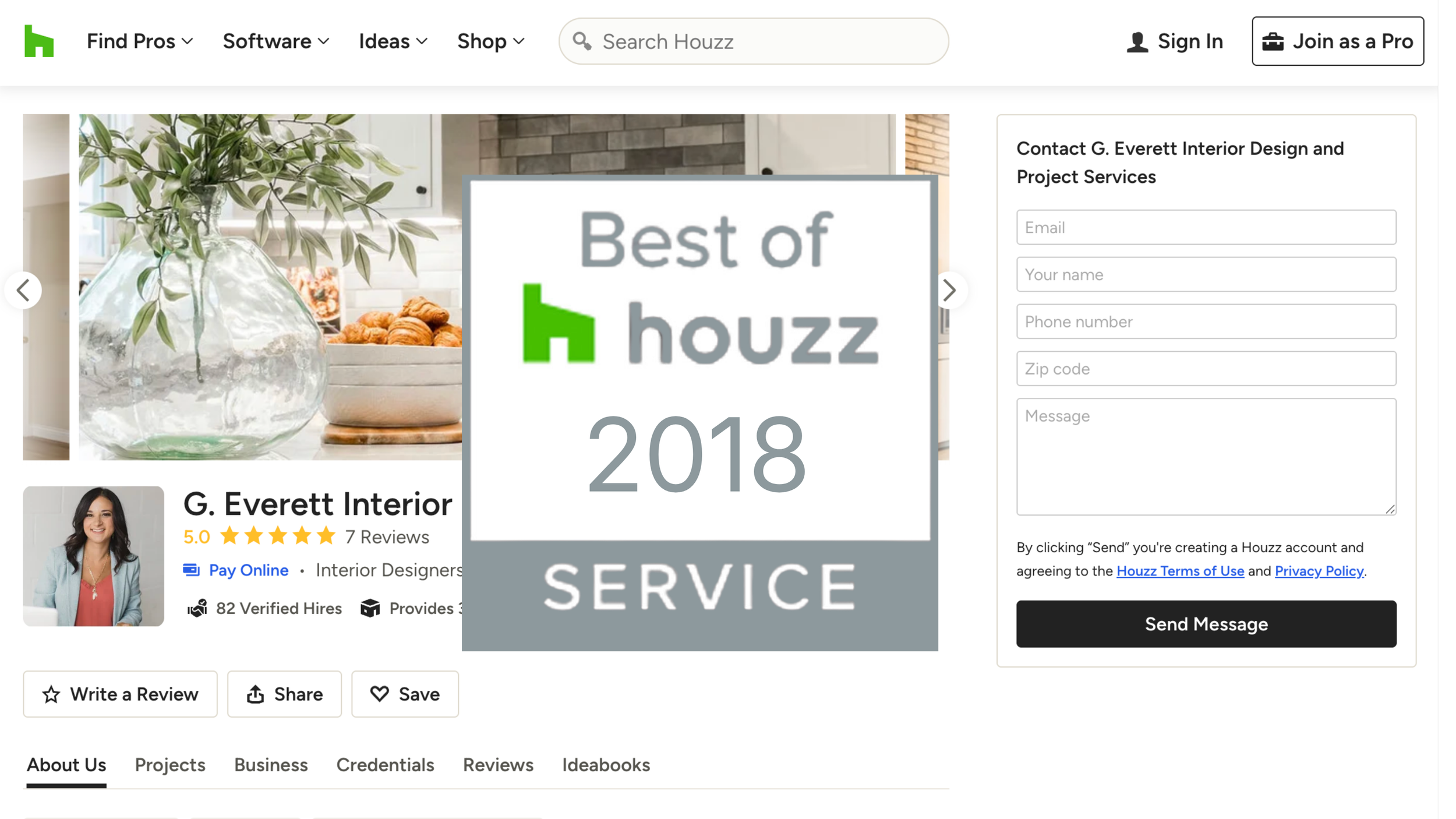 Screenshot of a website for G. Everett Interior Design and Project Services, featuring a large display with the text 'Best of Houzz 2018' and a photo of a kitchen with a glass vase, green plant, and pastries on a countertop, along with contact form and review information.