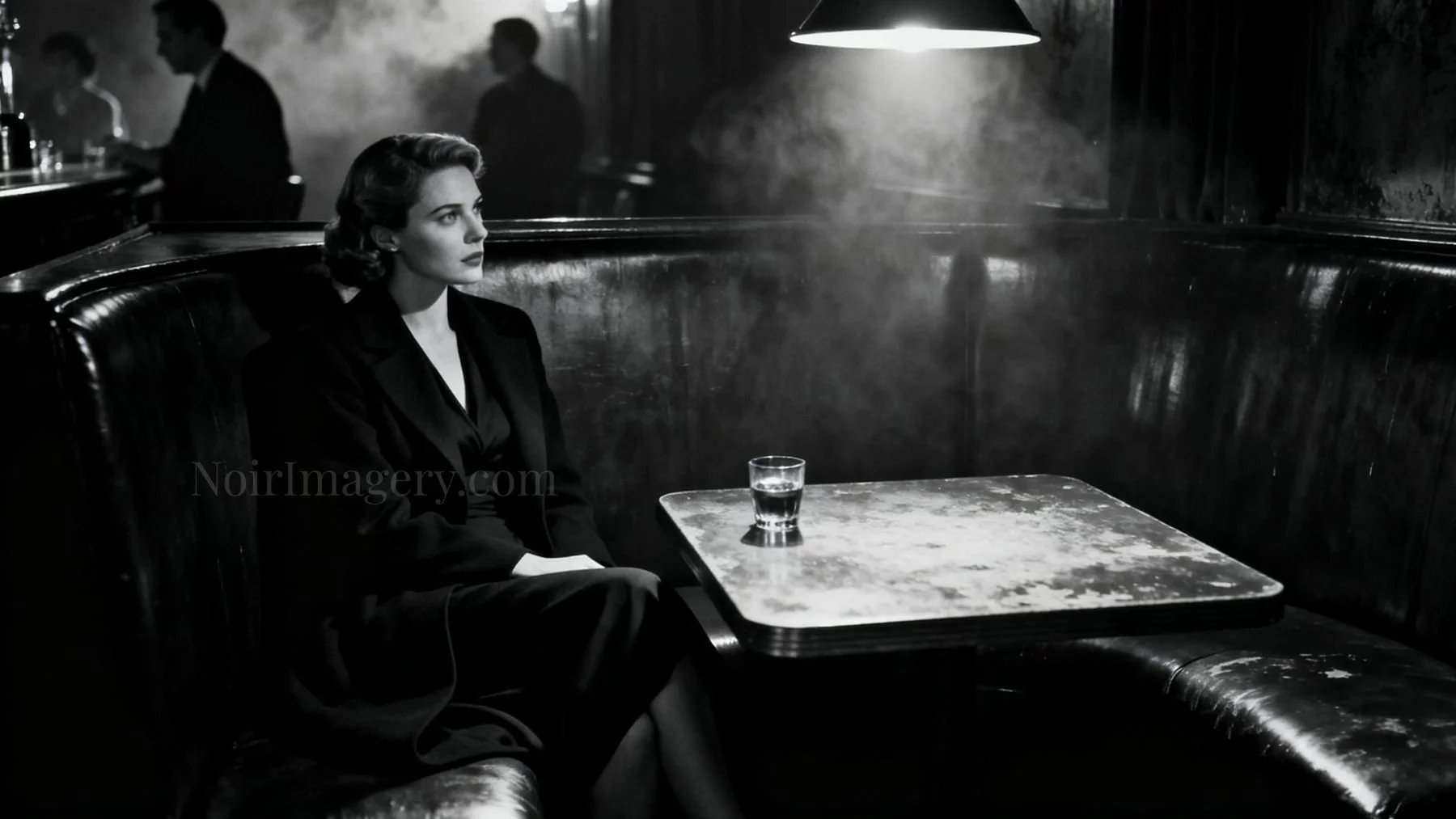 Black-and-white noir image of a tense woman sitting alone in a dimly lit bar booth waiting for a meeting.