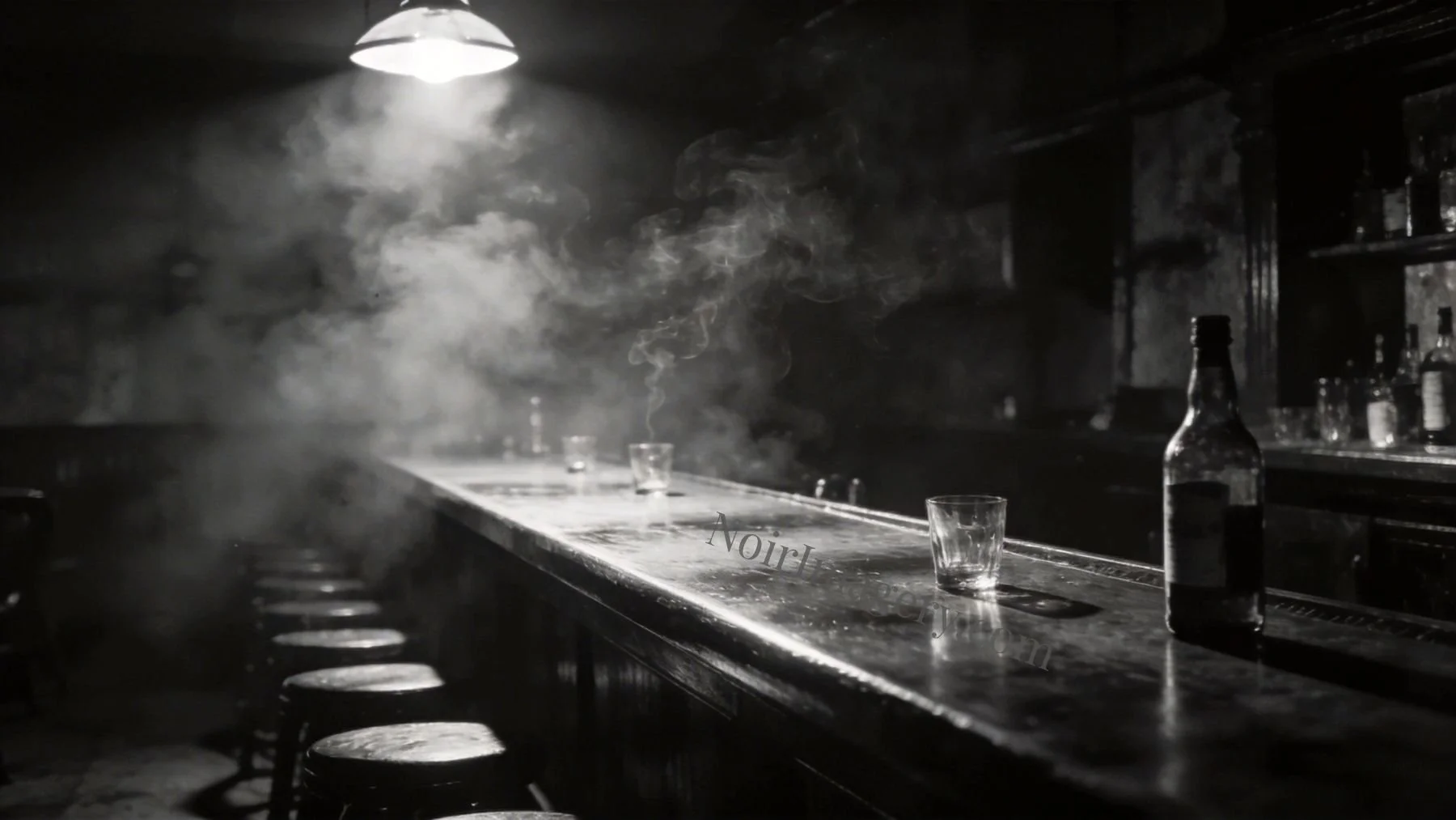 Empty bar showing glass and bottle left behind.