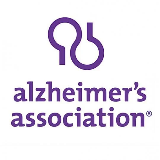 Logo of the Alzheimer's Association with a purple ribbon and stylized brain shape.