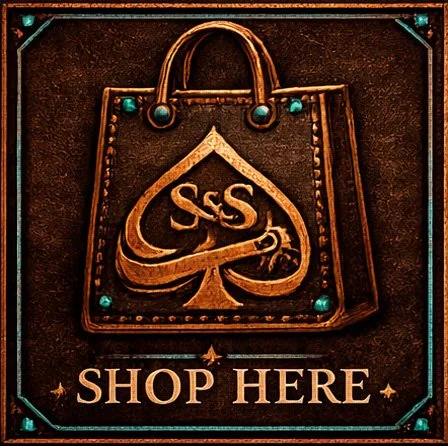 A sign with a textured dark background and a golden bag logo with the letters "SS" inside a spade shape. The sign says "SHOP HERE" at the bottom.