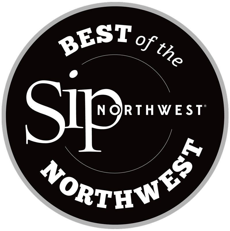 A circular black and gray logo that reads "Best of the Northwest" with the word "Sip" prominently in the center.